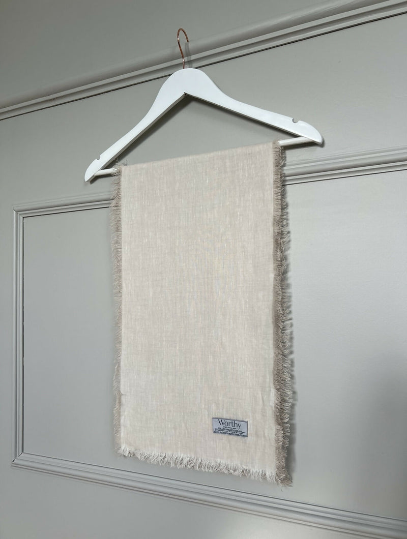 white scarf on hanger