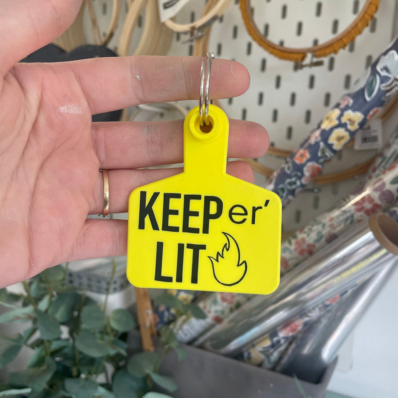 ‘KEEP ER LIT’ Cow Tag keyring