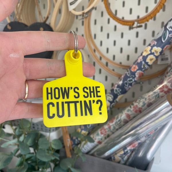 ‘HOW’S SHE CUTTIN?’ Cow Tag Keyring