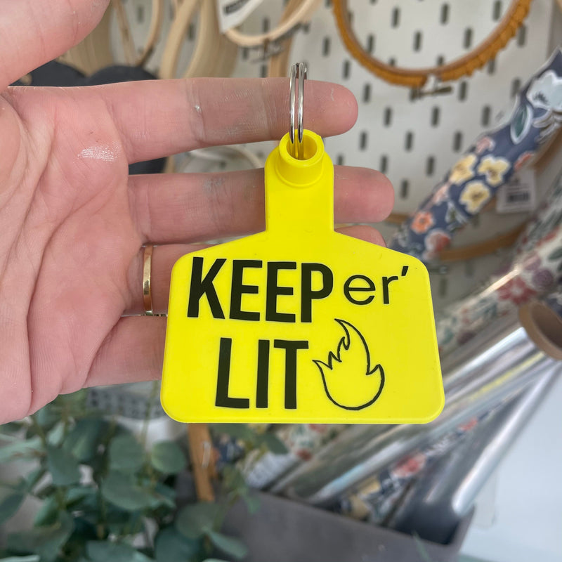 ‘KEEP ER LIT’ Cow Tag keyring